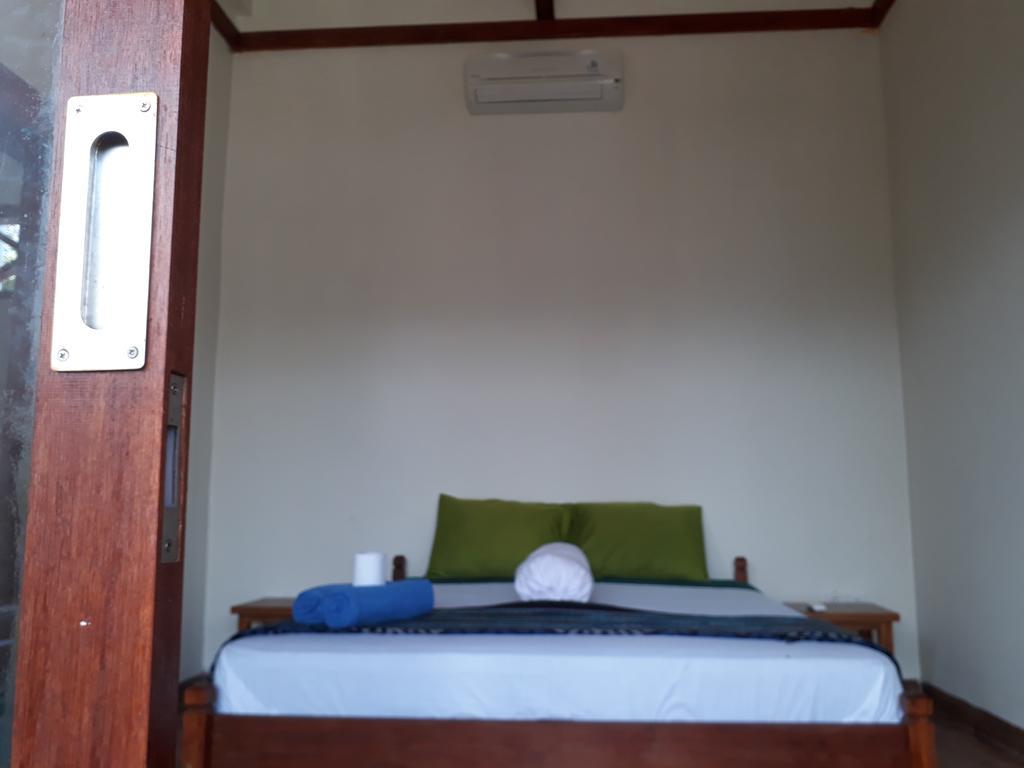 Kuta Bay Homestay Phòng bức ảnh