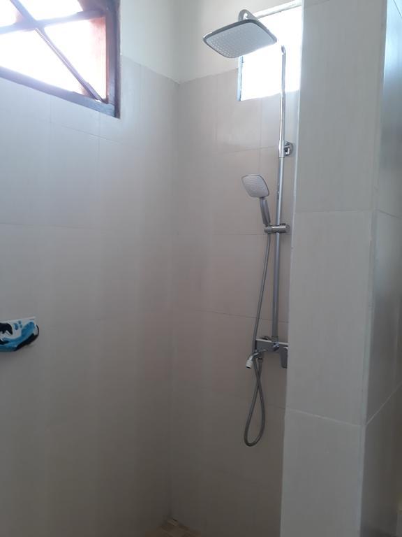 Kuta Bay Homestay Phòng bức ảnh